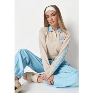 Playboy x Missguided cropped long-sleeve polo shirt.